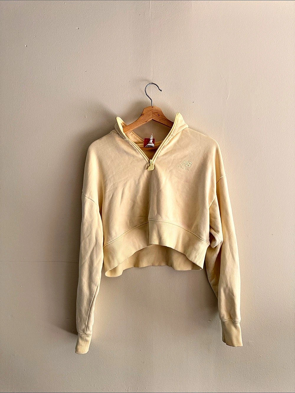 New Balance Cropped Quarter-Zip Sweatshirt in Yellow